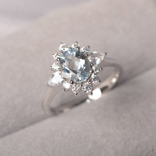 Oval Cut Aquamarine Ring With Pear Side Stone