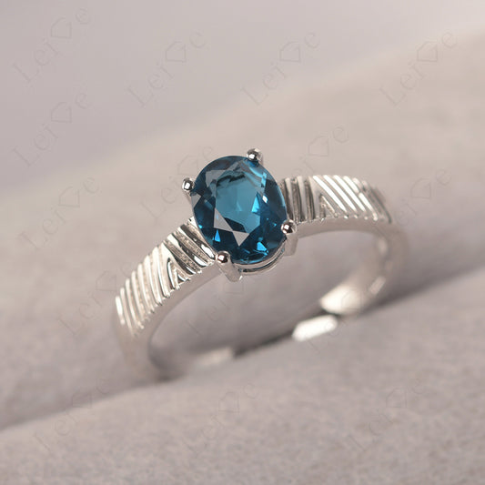 Oval London Blue Topaz Wide Band Engagement Ring