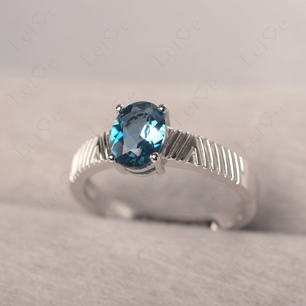 Oval London Blue Topaz Wide Band Engagement Ring