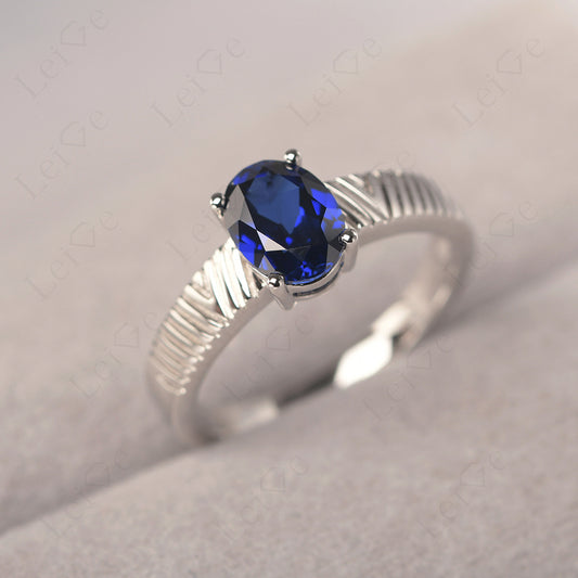 Oval Sapphire Wide Band Engagement Ring