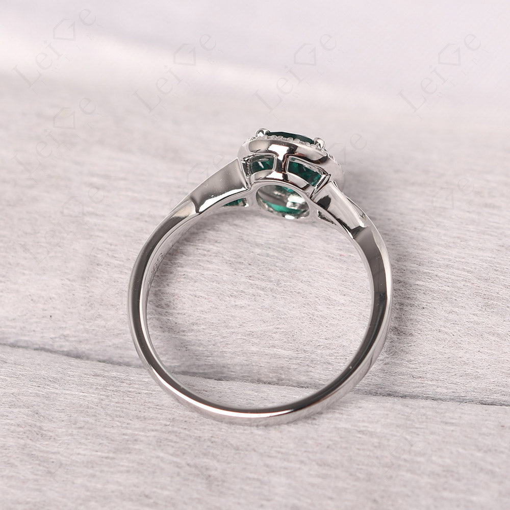 Oval Emerald Halo Engagement Ring