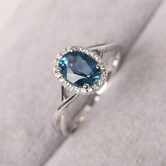 Oval London Blue Topaz Halo Engagement Ring