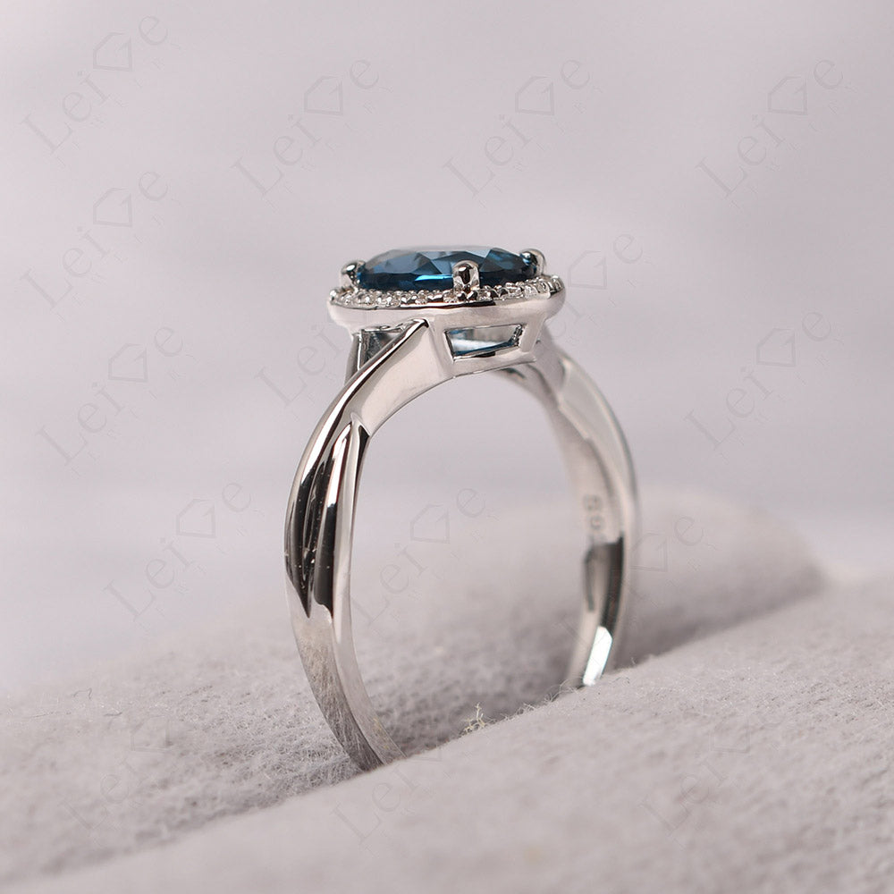 Oval London Blue Topaz Halo Engagement Ring
