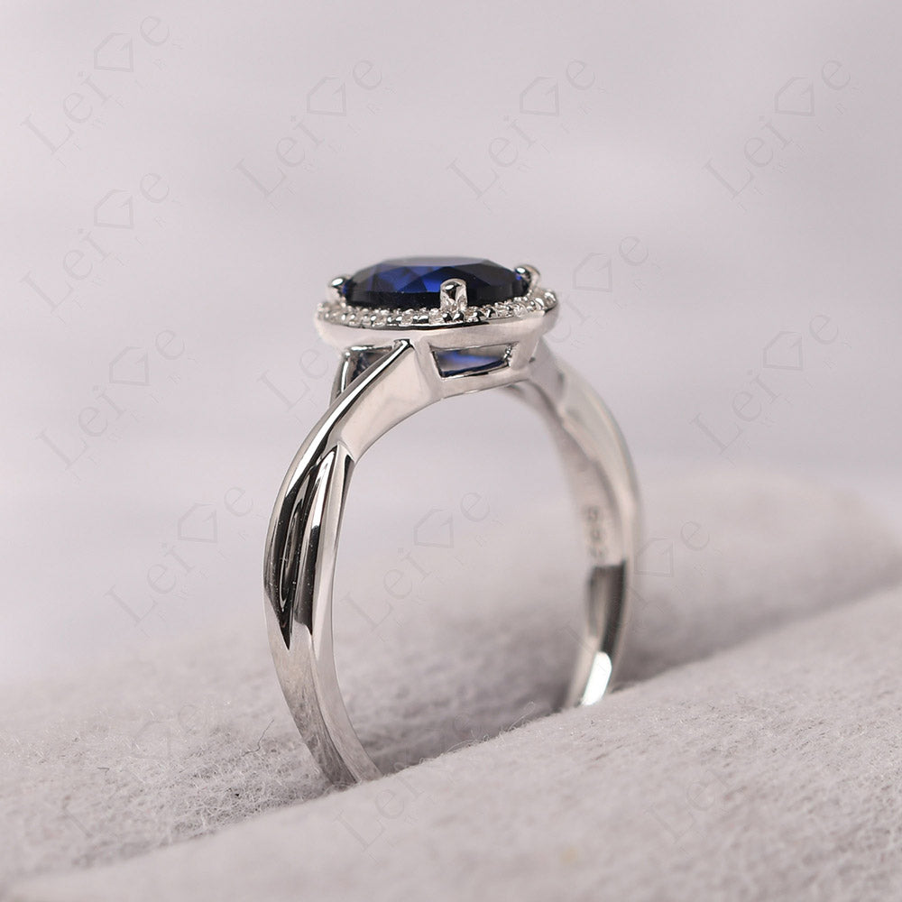 Oval Sapphire Halo Engagement Ring