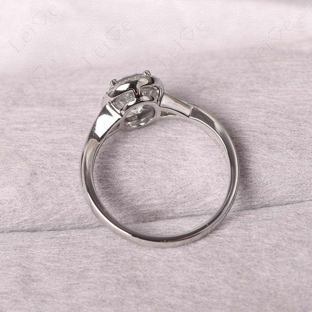 Oval White Topaz Halo Engagement Ring