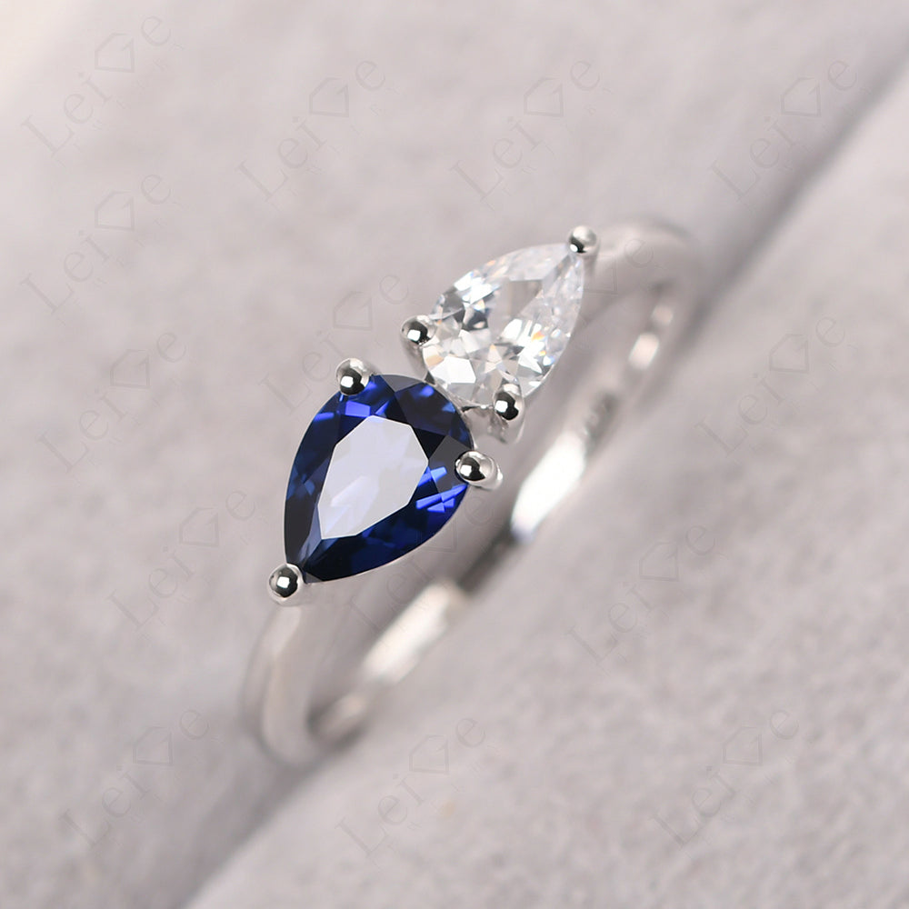 East West Pear Cubic Zirconia And Sapphire Ring