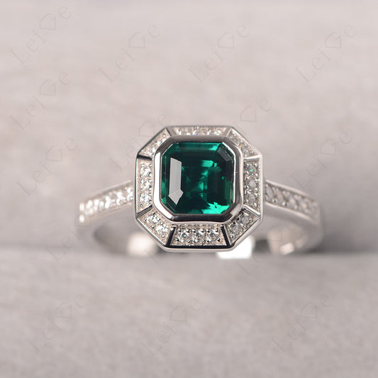 Asscher Cut Emerald Bezel Set Halo Engagement Ring