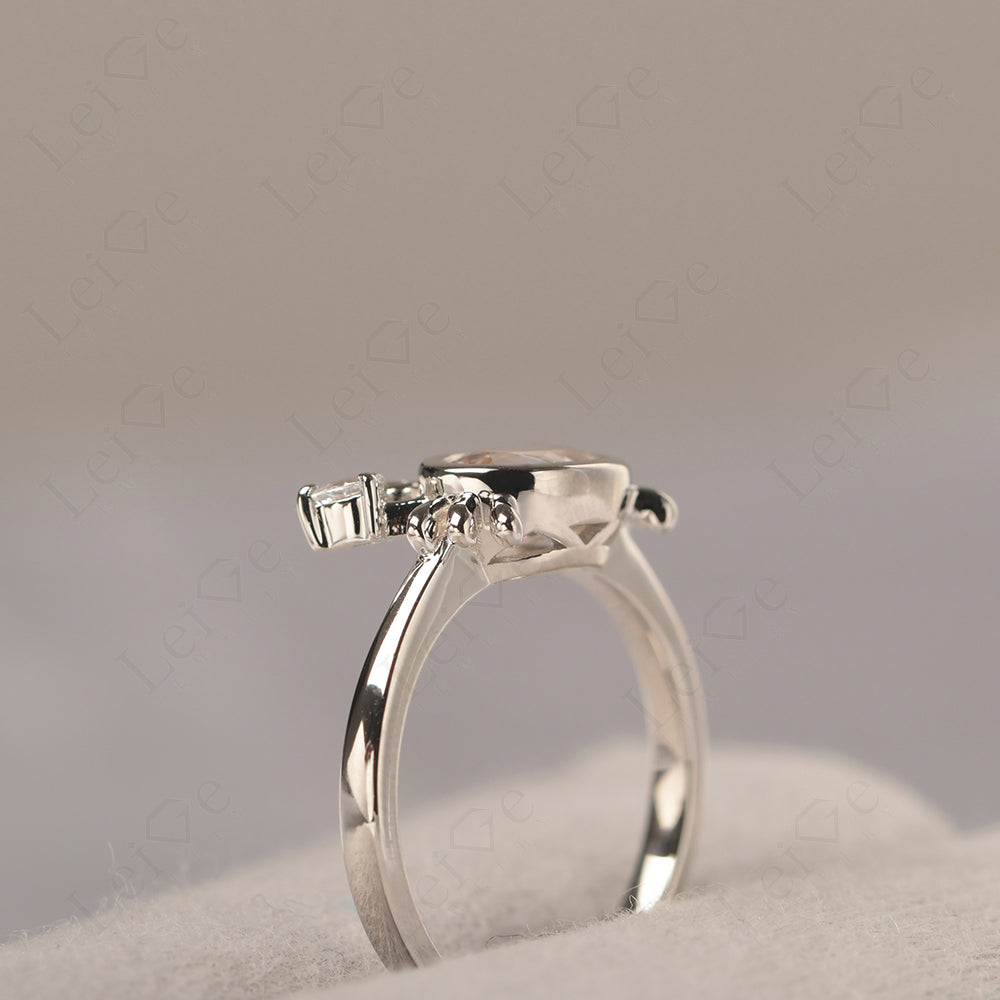 Oval Shape Bezel Set Morganite Crab Rings