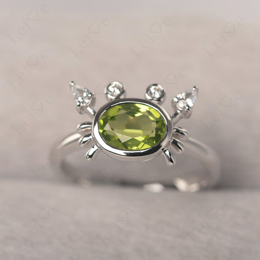 Oval Shape Bezel Set Peridot Crab Rings
