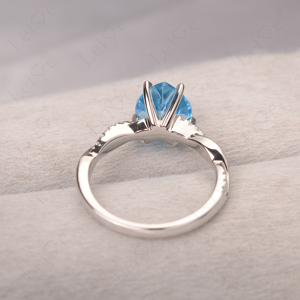 Twisted Heart Shaped Swiss Blue Topaz Ring White Gold
