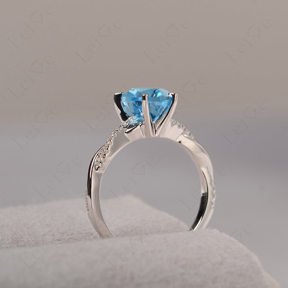 Twisted Heart Shaped Swiss Blue Topaz Ring White Gold
