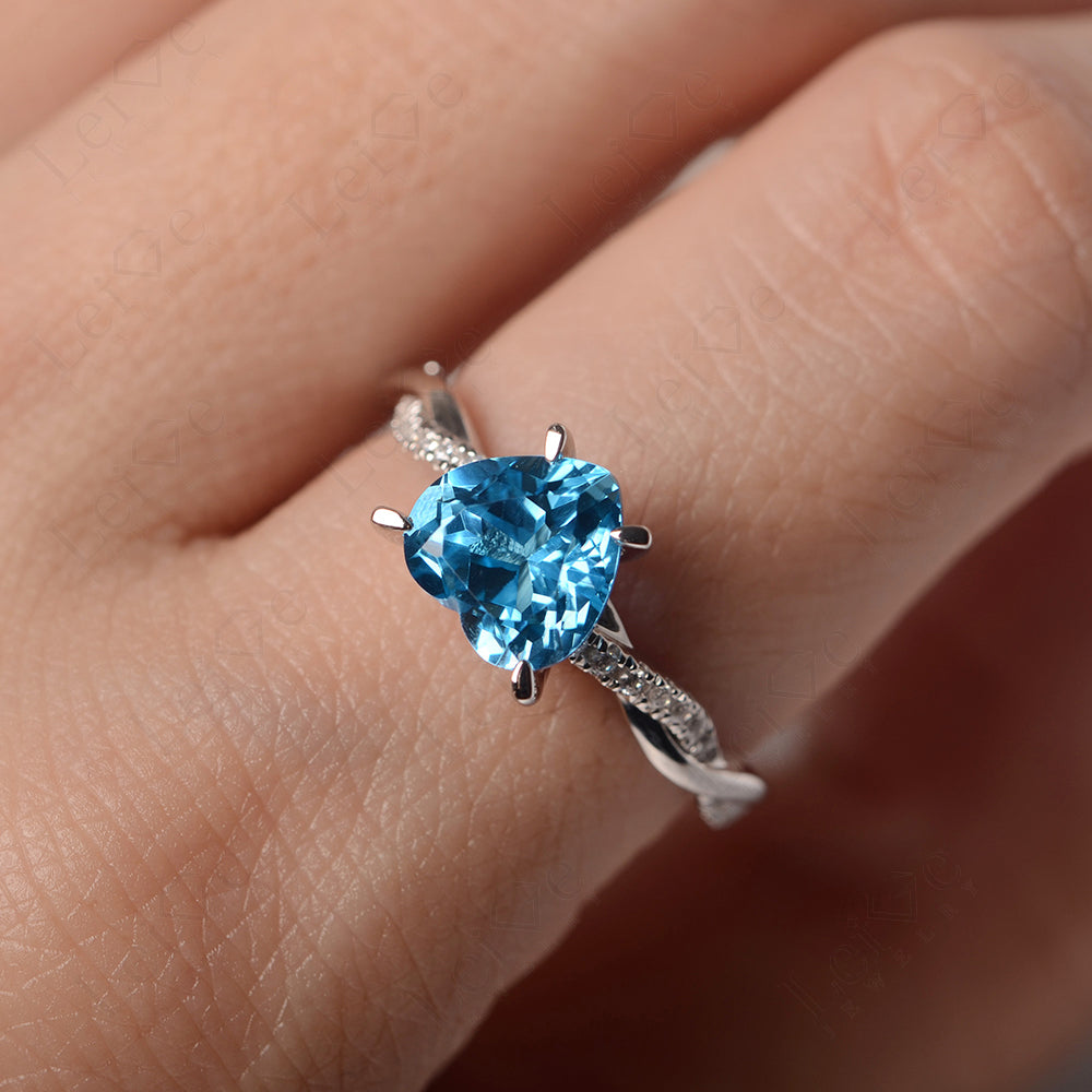 Twisted Heart Shaped Swiss Blue Topaz Ring White Gold