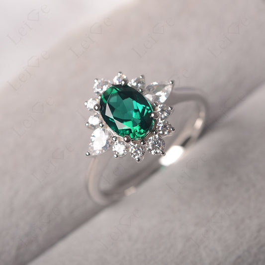 Oval Cut Emerald Ring With Pear Side Stone