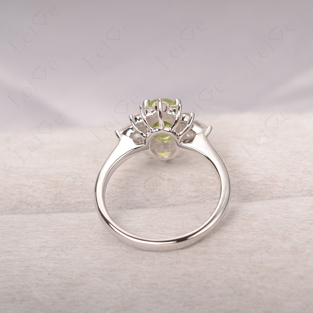 Oval Cut Peridot Ring With Pear Side Stone