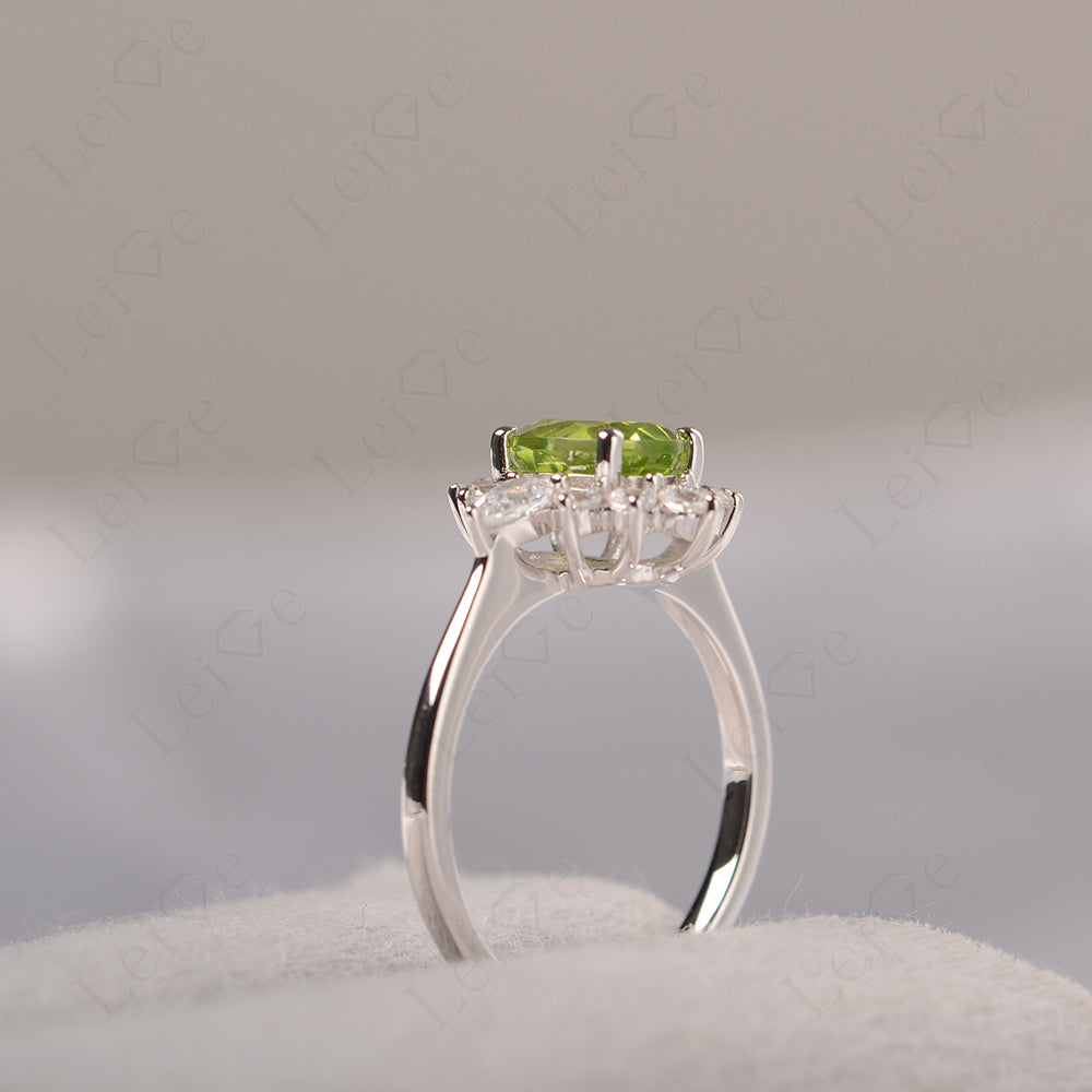 Oval Cut Peridot Ring With Pear Side Stone