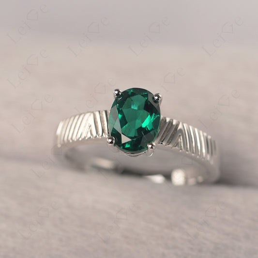 Oval Emerald Wide Band Engagement Ring