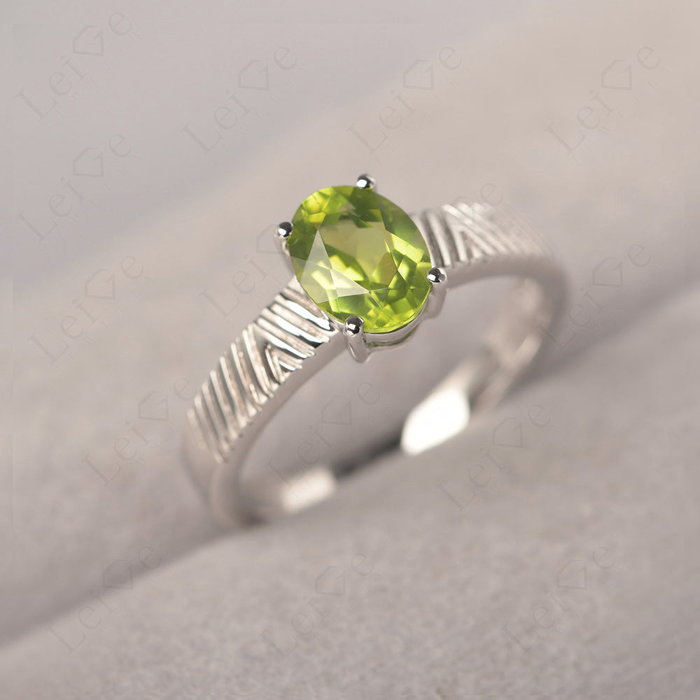 Oval Peridot Wide Band Engagement Ring