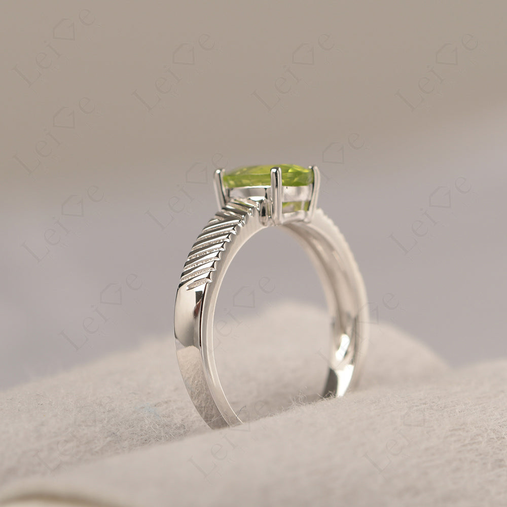Oval Peridot Wide Band Engagement Ring