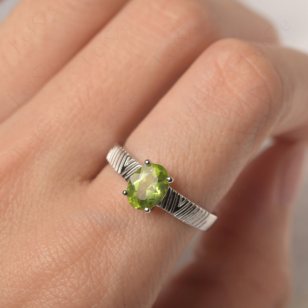 Oval Peridot Wide Band Engagement Ring