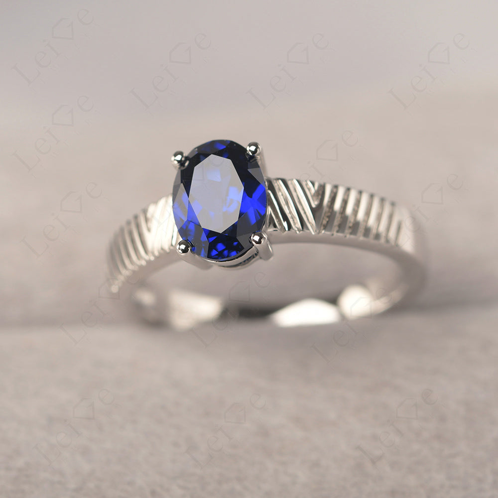 Oval Sapphire Wide Band Engagement Ring