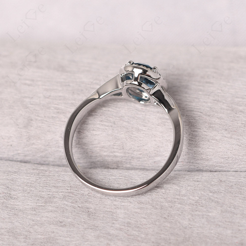 Oval London Blue Topaz Halo Engagement Ring